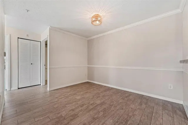 a view of kitchen with wooden floor