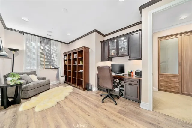 a view of a chairs and table in the backyard