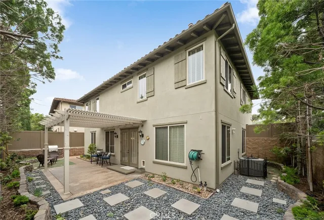 a bedroom with furniture and window