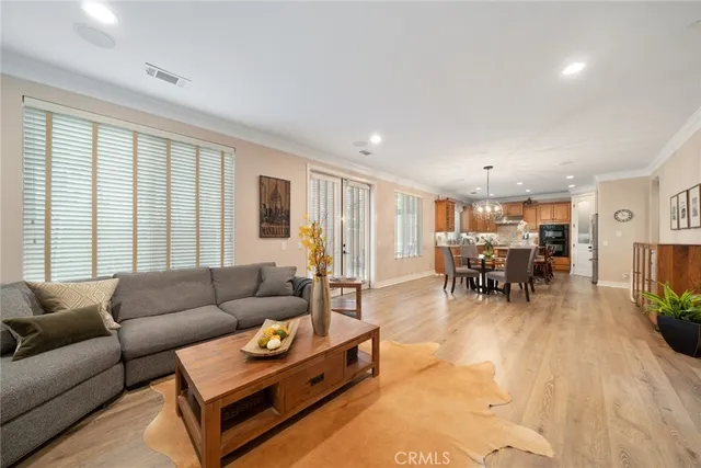 a bedroom with a large bed and a fireplace