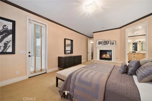 a bathroom with a sink mirror and toilet