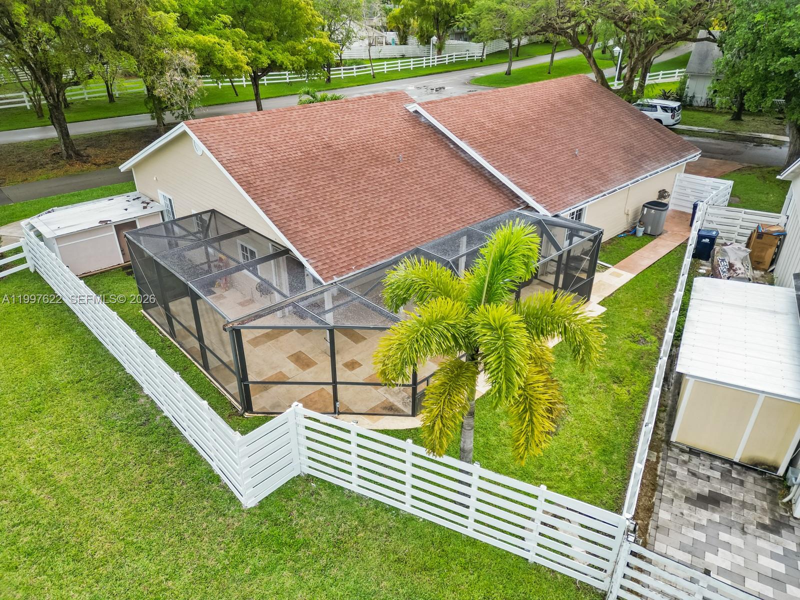 14912 Southwest 143rd Court, Unit 14912 Miami, FL 33186 - Photo 6 of 35 an aerial view of a house