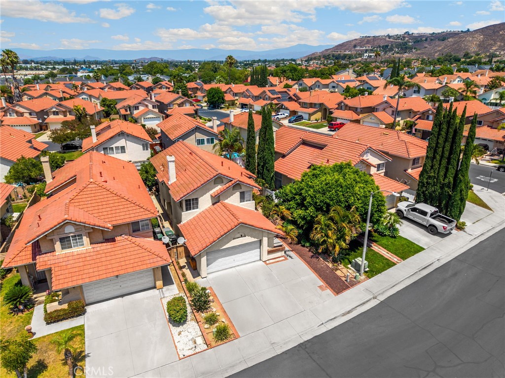 3631 Snowdrift Drive Riverside, CA 92503 - Photo 13 of 36 an aerial view of residential houses with outdoor space and street view