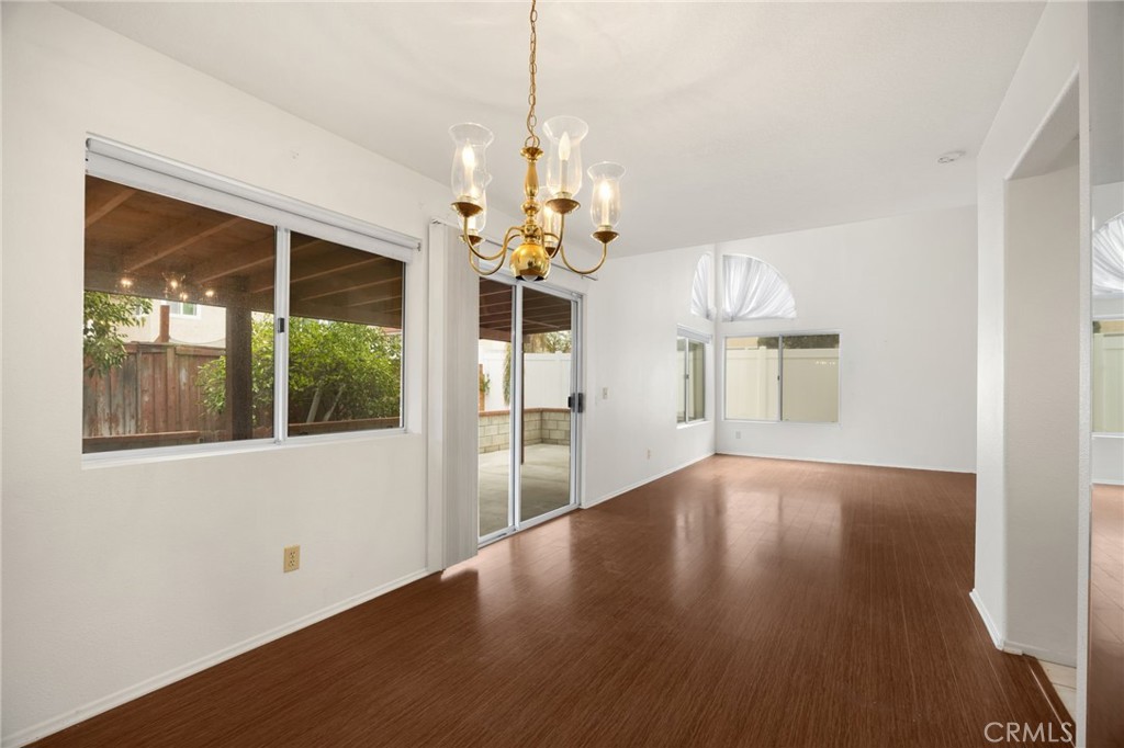 3631 Snowdrift Drive Riverside, CA 92503 - Photo 23 of 36 a view of a room with wooden floor and windows