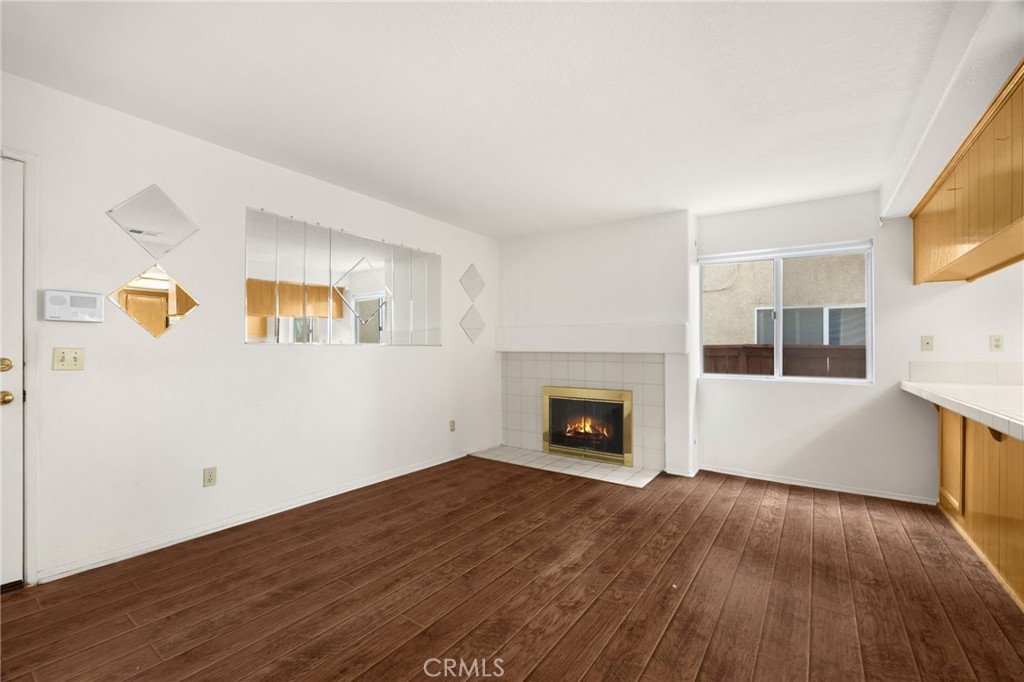 3631 Snowdrift Drive Riverside, CA 92503 - Photo 26 of 36 a view of empty room with wooden floor and a window