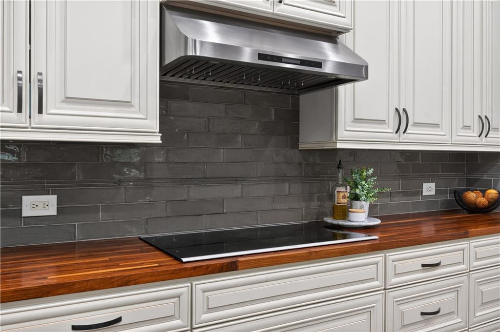 632 Geiger Road Jefferson, GA 30549 - Photo 21 of 55 a kitchen with a sink and cabinets