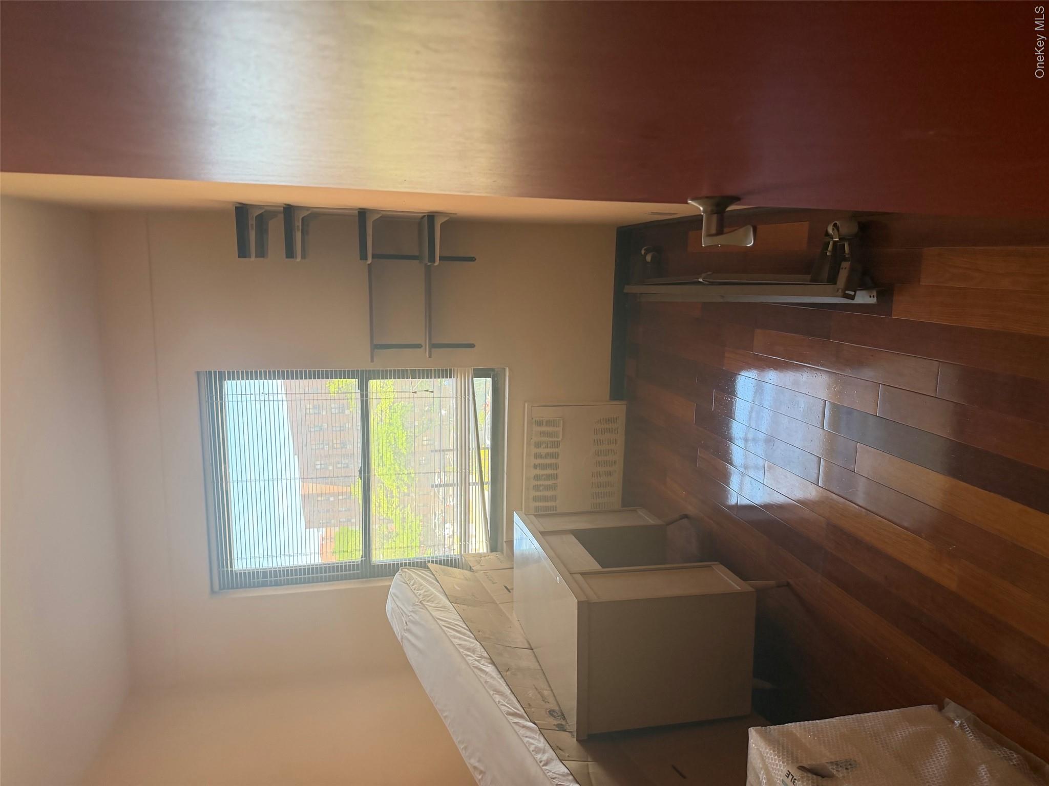 99-32 66th Road, Unit 3AA Queens, NY 11374 - Photo 8 of 9 a room with a window