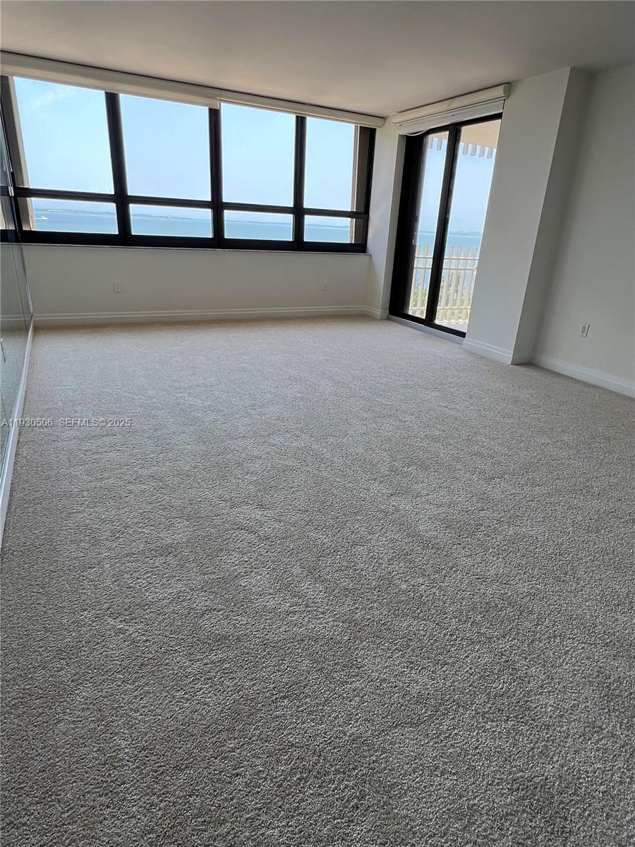 2 Grove Isle Drive, Unit B703 Miami, FL 33133 - Photo 4 of 11 Master Bedroom