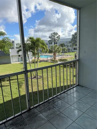 a view of balcony with furniture
