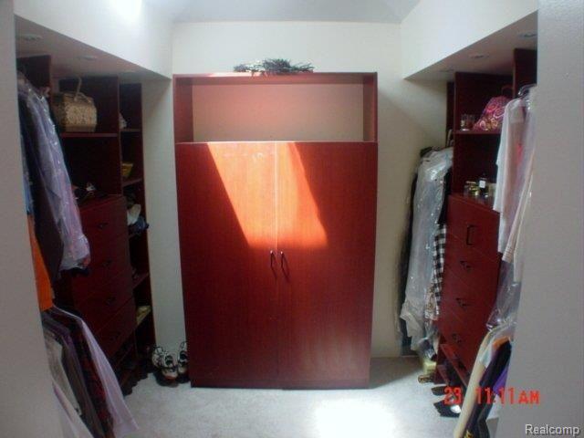 9623 Marshall Road South Lyon, MI 48178 - Photo 18 of 22 Custom Walk-in closet.jpg