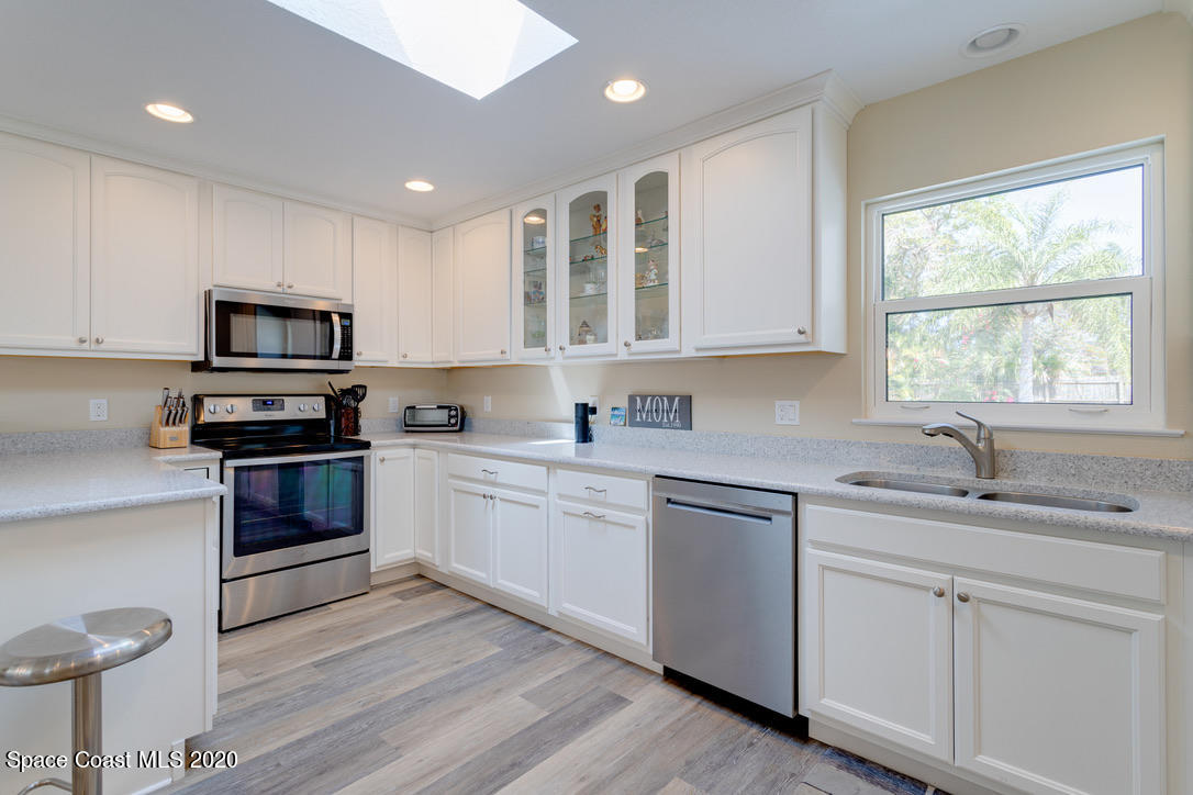 898 Brunswick Lane Rockledge, FL 32955 - Photo 11 of 49 A Sky Lit Kithen