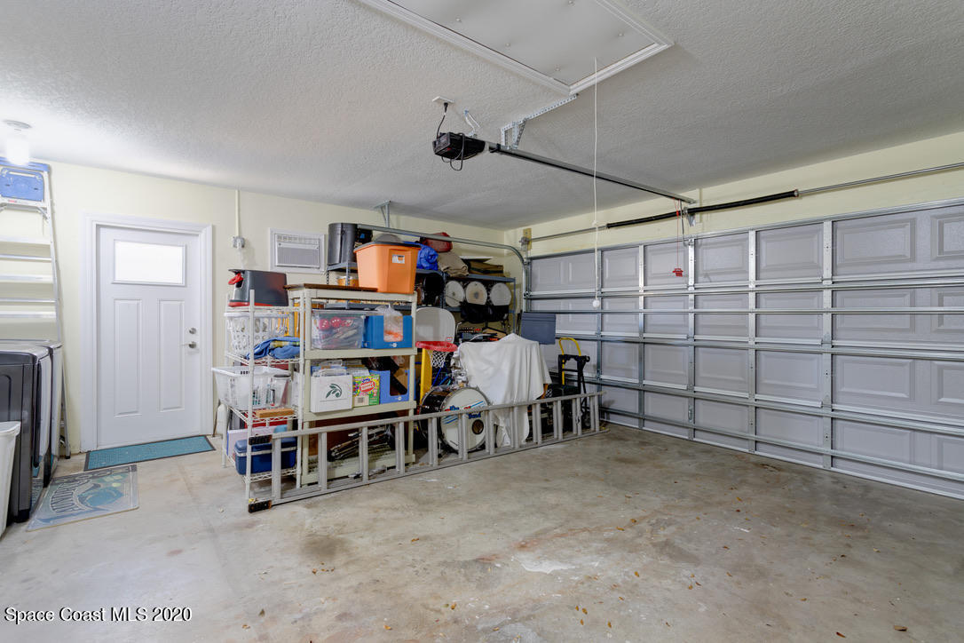 898 Brunswick Lane Rockledge, FL 32955 - Photo 19 of 49 Laundry Hook Up /AC/Side Door