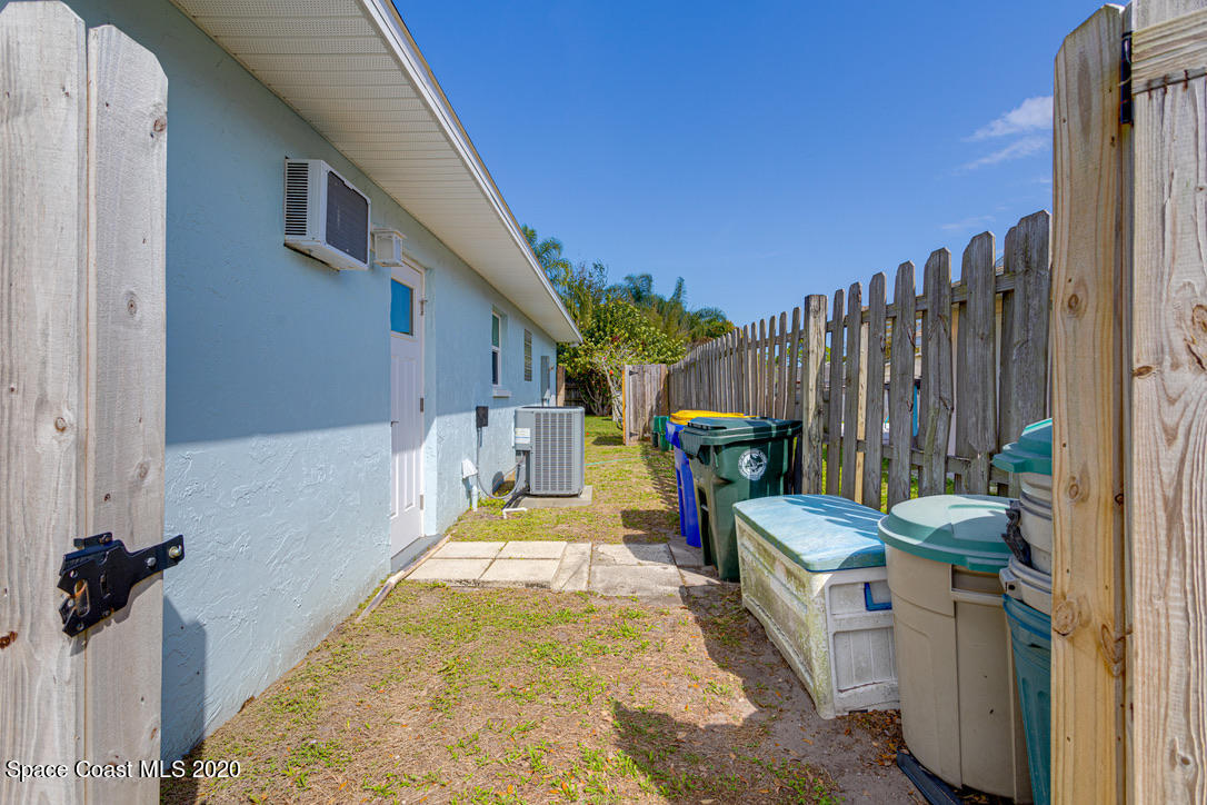 898 Brunswick Lane Rockledge, FL 32955 - Photo 20 of 49 Garage Door to Dog Run