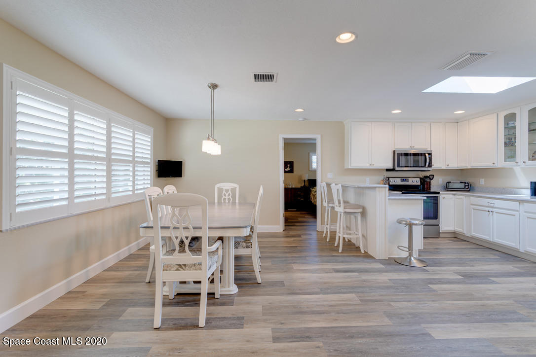 898 Brunswick Lane Rockledge, FL 32955 - Photo 22 of 49 Kitchen to Master Bed