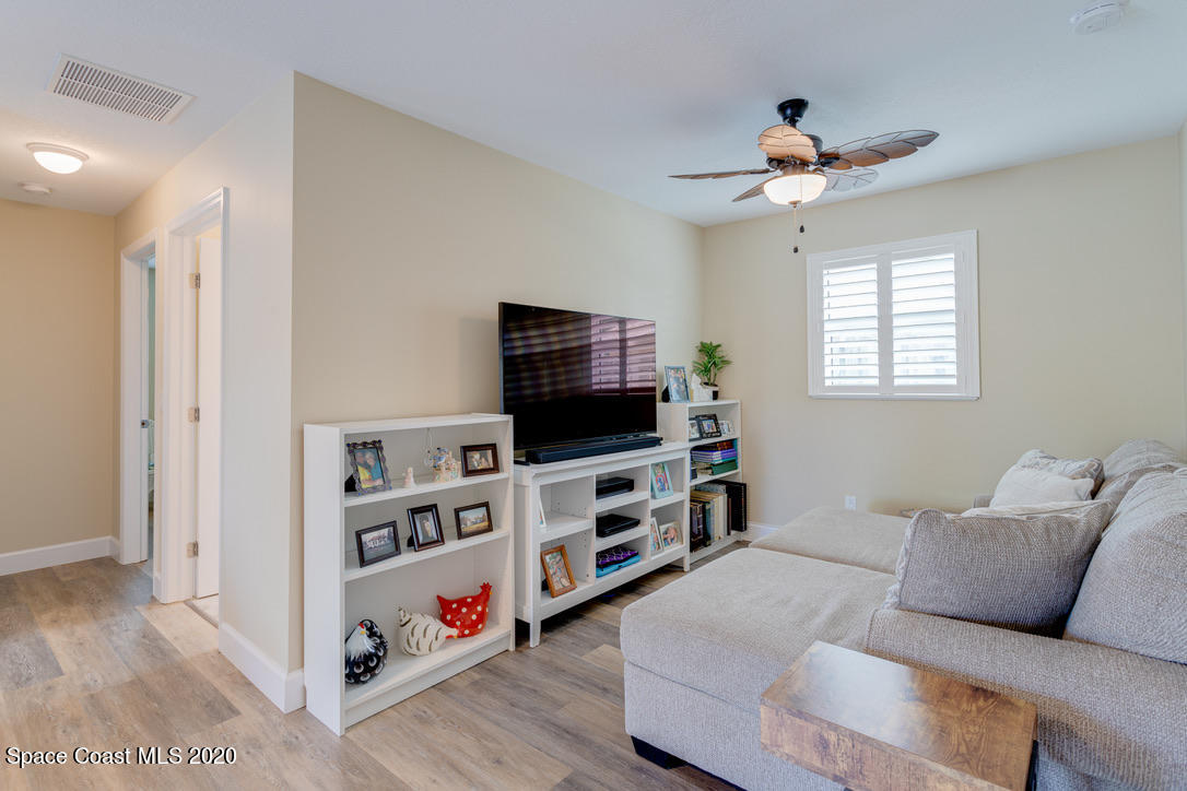 898 Brunswick Lane Rockledge, FL 32955 - Photo 34 of 49 Greatroom Leads to Rear of Home