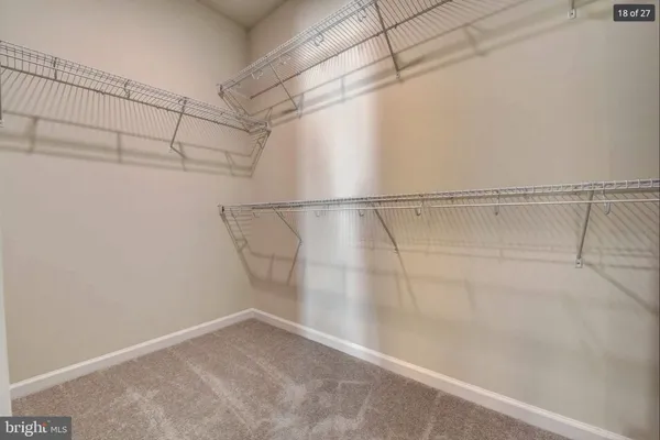 a view of a room with racks on the wall