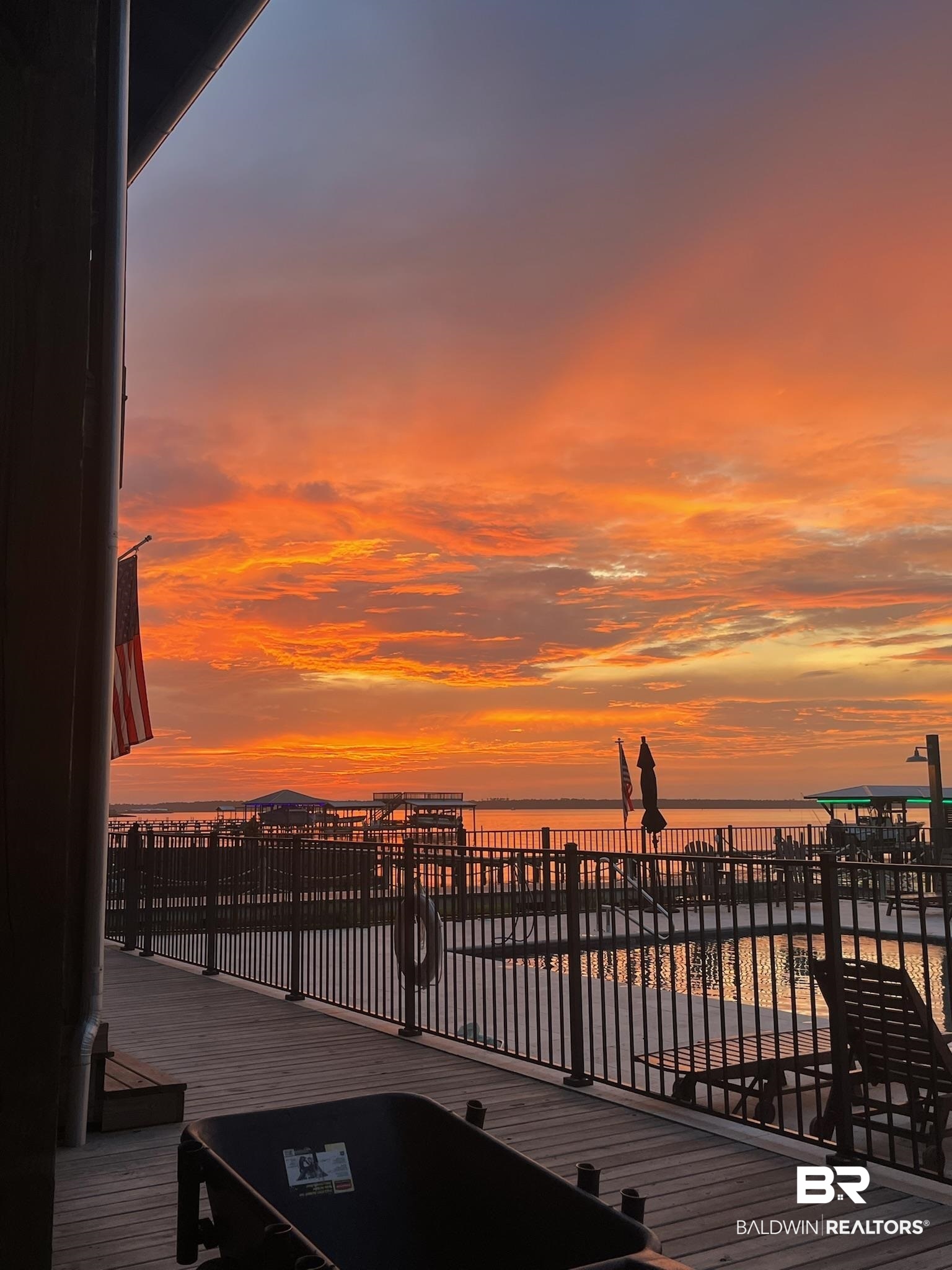 25773 Canal Road, Unit 38 Orange Beach, AL 36561 - Photo 38 of 38 Deck at dusk featuring a water view