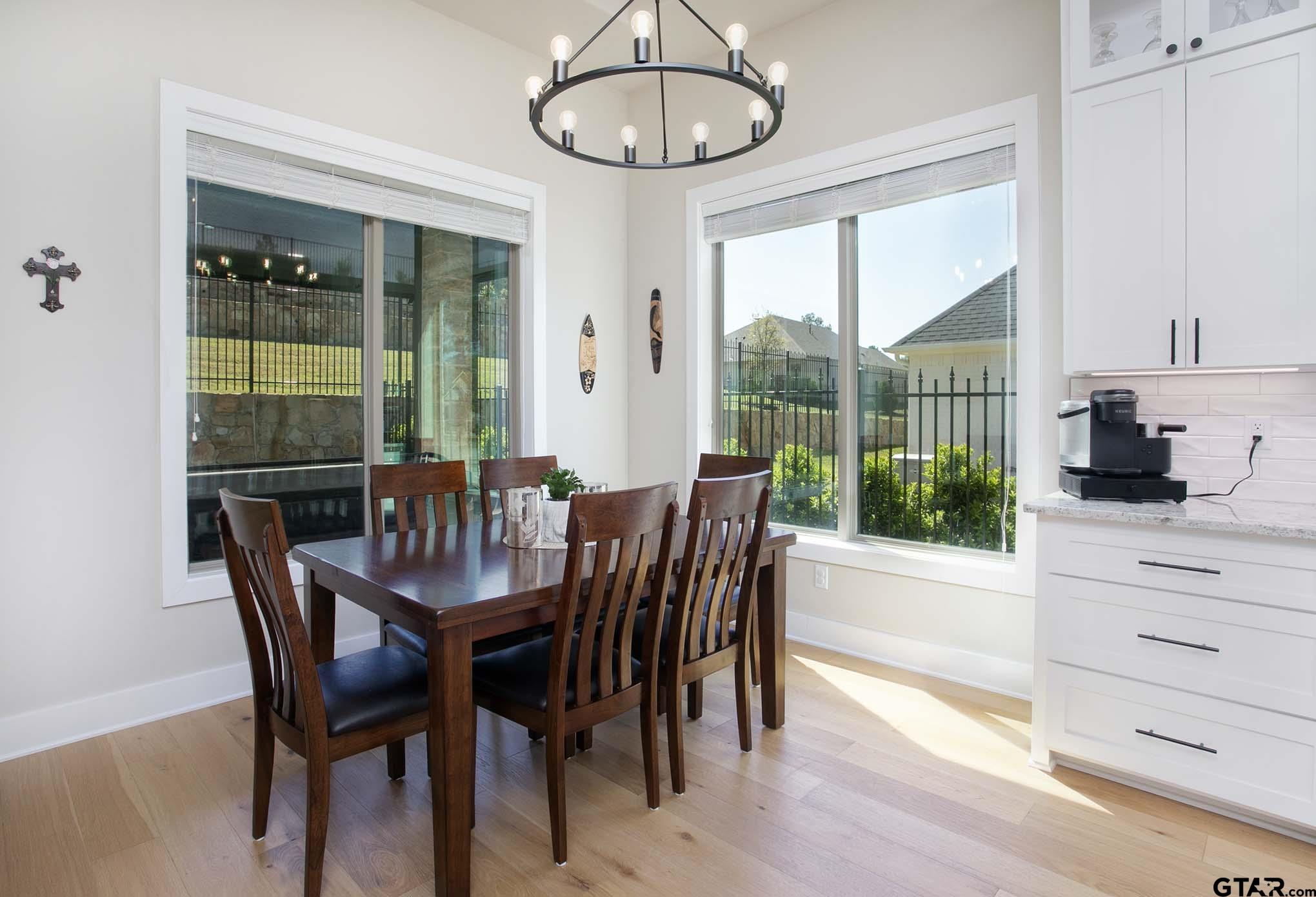 7434 Waterview Square Tyler, TX 75703 - Photo 12 of 33 a view of a dining room with furniture window and outside view