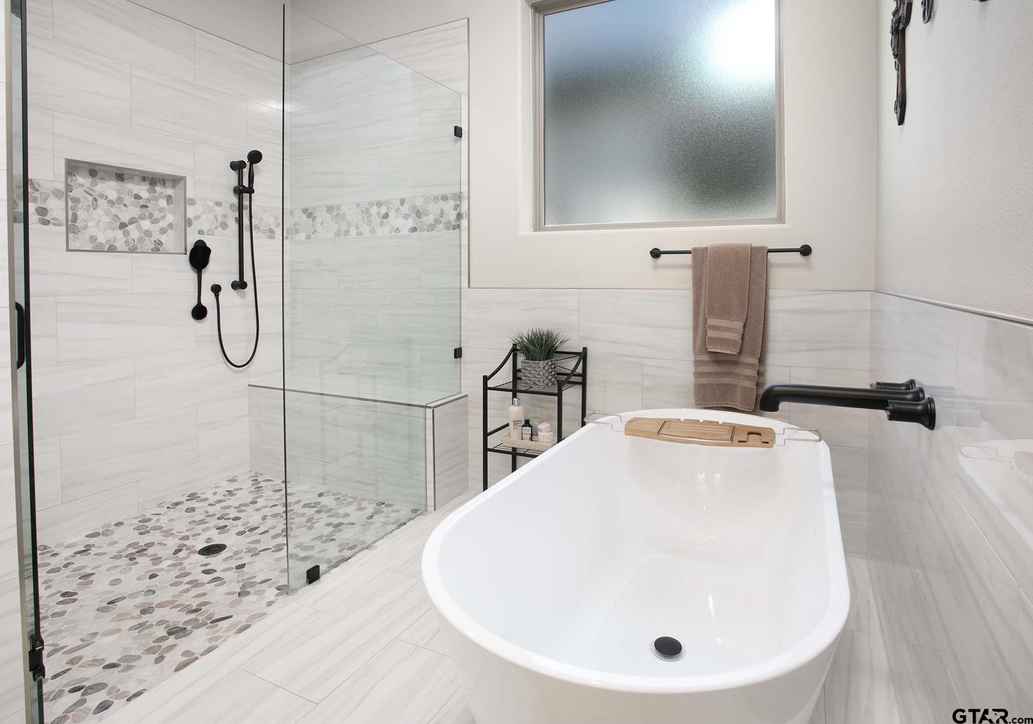 7434 Waterview Square Tyler, TX 75703 - Photo 17 of 33 a bathroom with a sink and a mirror