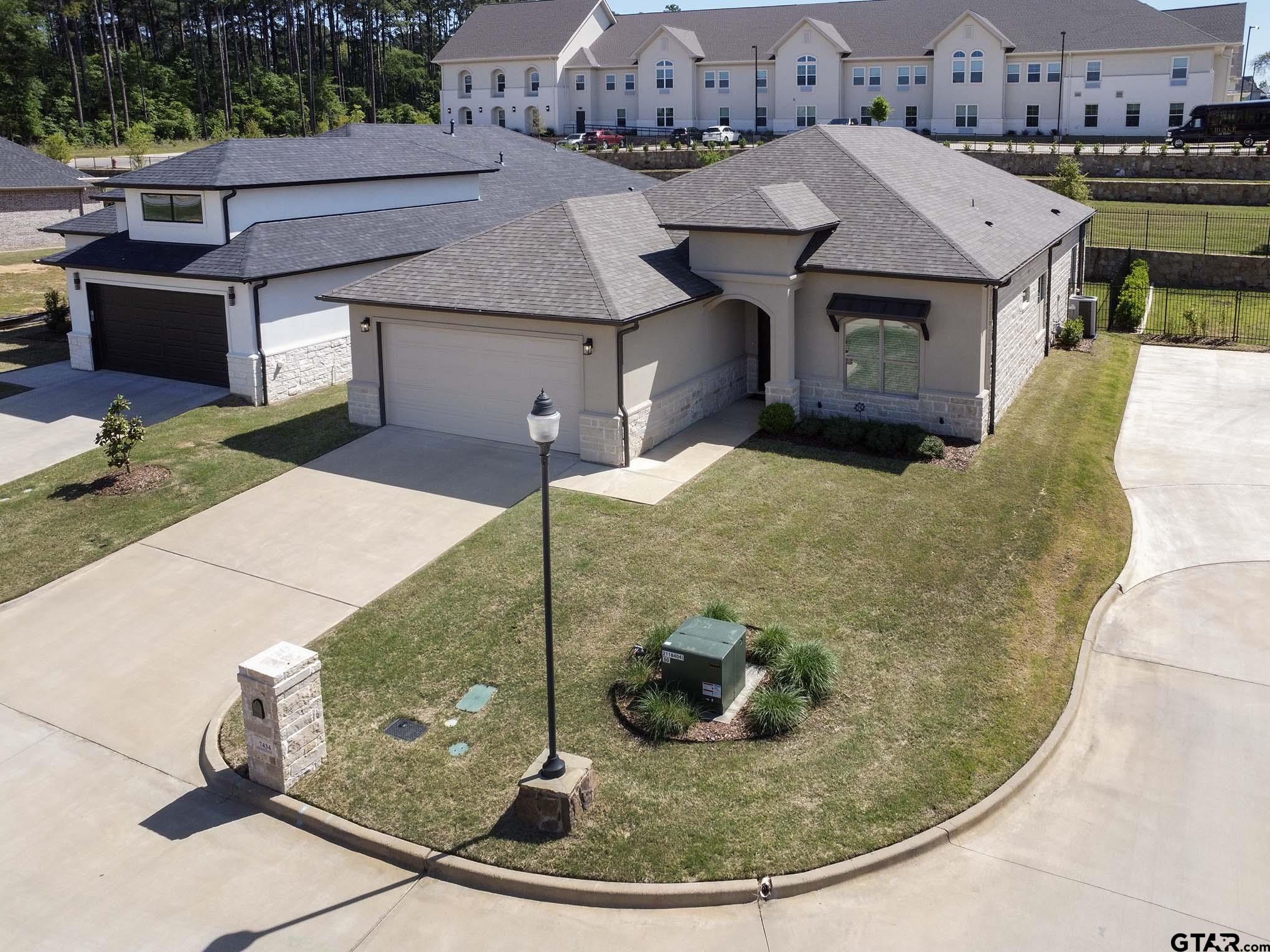 7434 Waterview Square Tyler, TX 75703 - Photo 3 of 33 a view of a house with a entertaining space