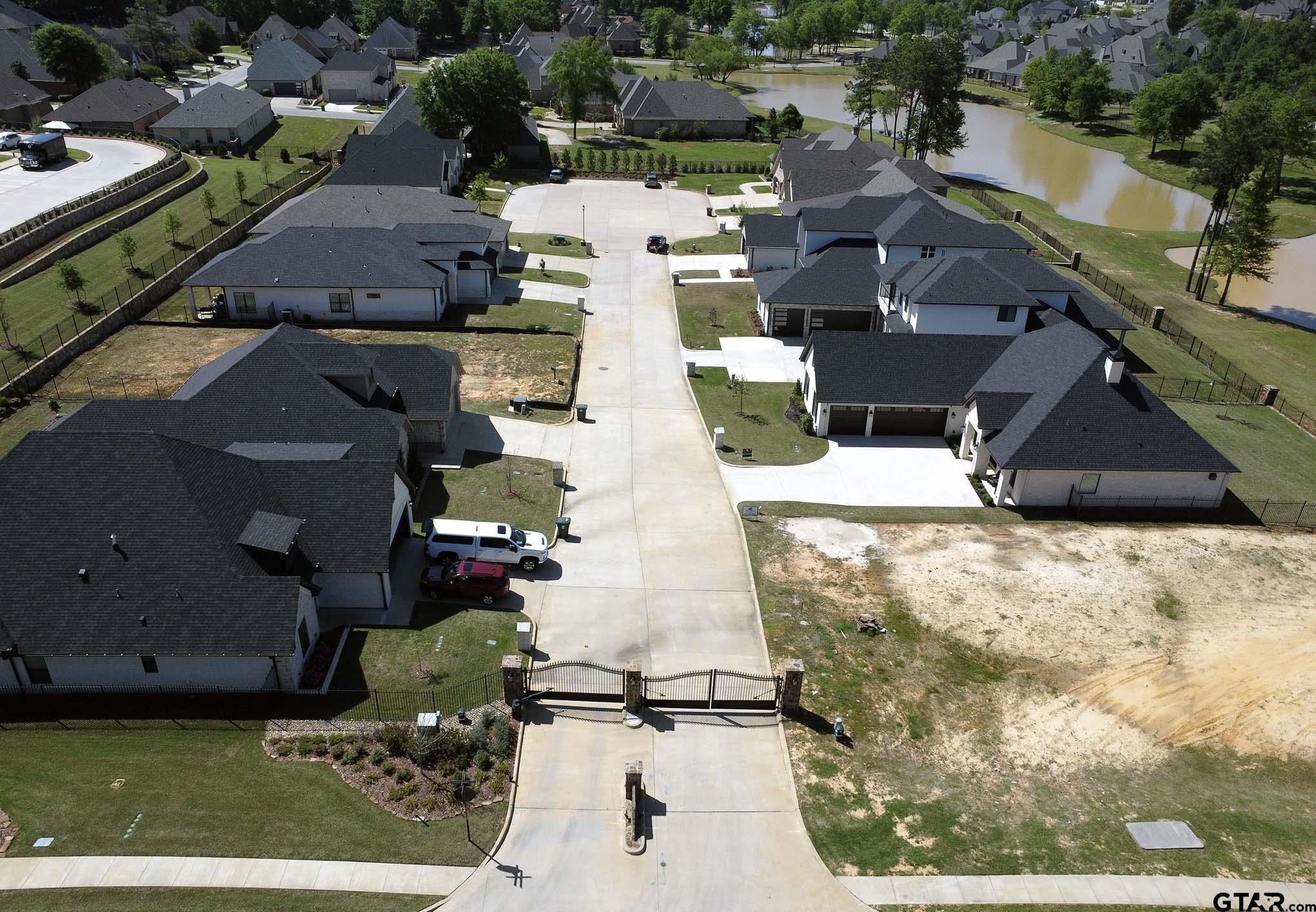 7434 Waterview Square Tyler, TX 75703 - Photo 33 of 33 an aerial view of a house with a yard