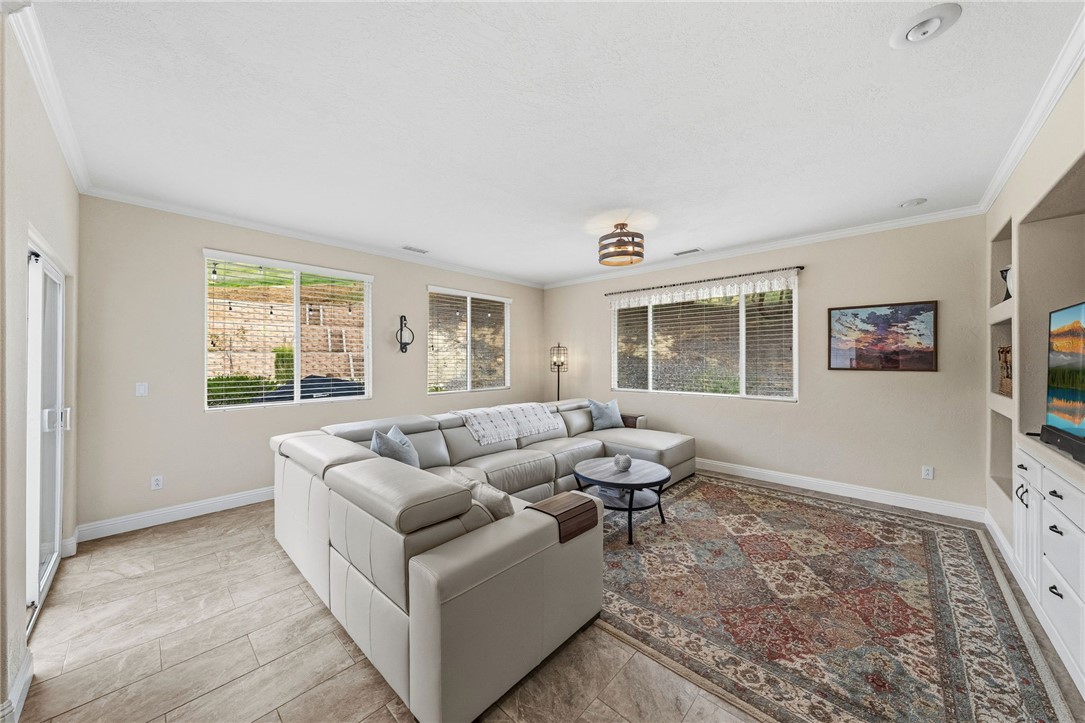 45600 La Cruz Drive Temecula, CA 92590 - Photo 33 of 75 a living room with furniture and a window