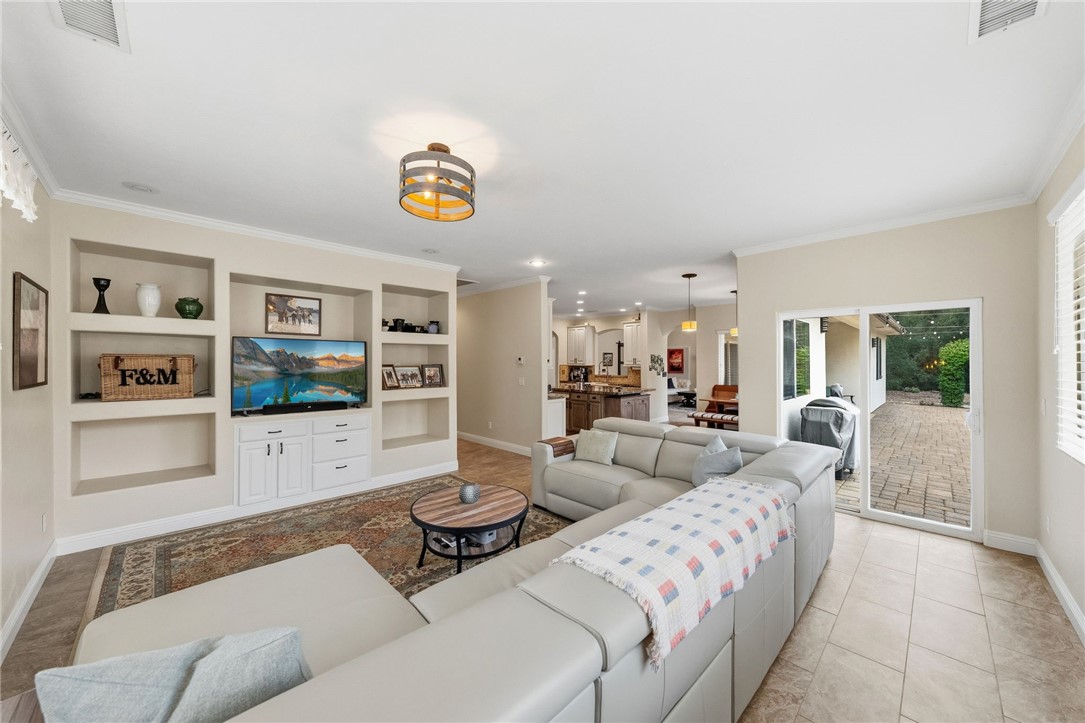45600 La Cruz Drive Temecula, CA 92590 - Photo 36 of 75 a living room with furniture and a flat screen tv