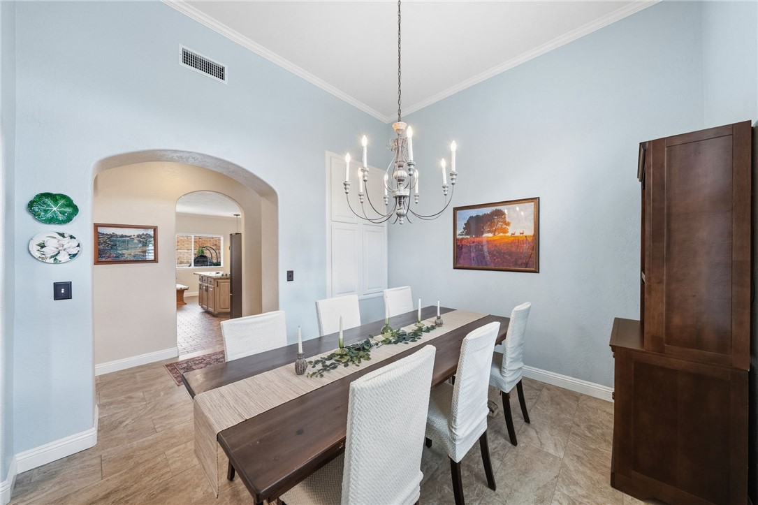 45600 La Cruz Drive Temecula, CA 92590 - Photo 37 of 75 a view of a dining room with furniture and chandelier