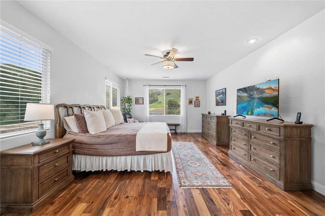 45600 La Cruz Drive Temecula, CA 92590 - Photo 43 of 75 a bedroom with furniture and a flat screen tv