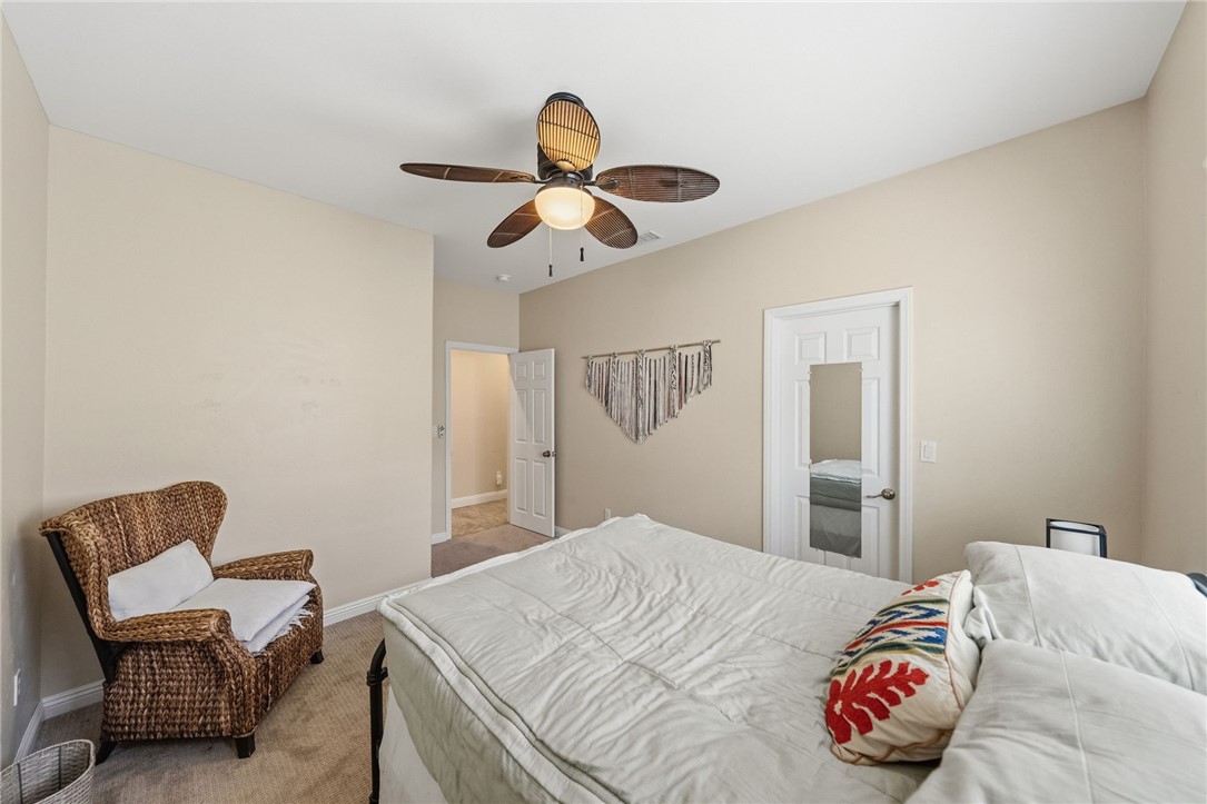 45600 La Cruz Drive Temecula, CA 92590 - Photo 52 of 75 a bedroom with a bed and a chair