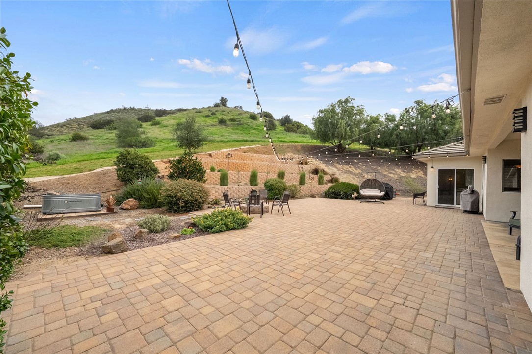 45600 La Cruz Drive Temecula, CA 92590 - Photo 59 of 75 a view of a swimming pool and a yard
