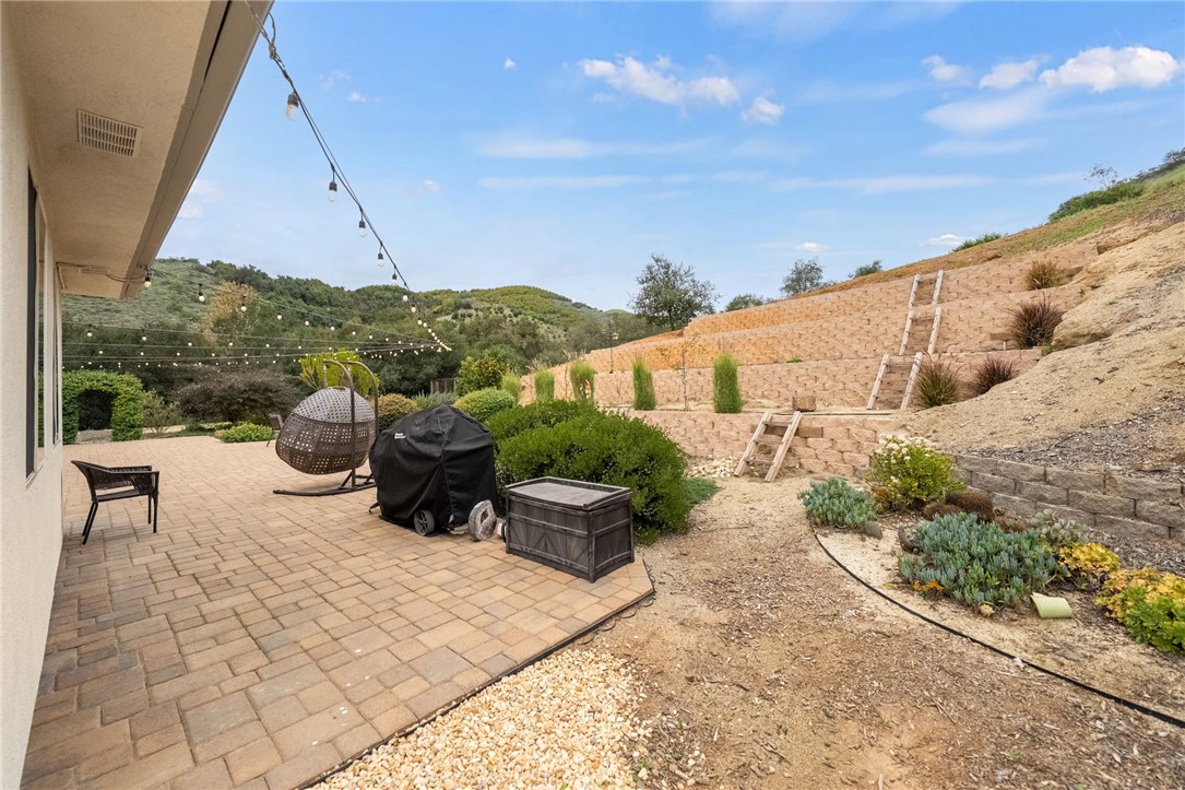 45600 La Cruz Drive Temecula, CA 92590 - Photo 64 of 75 a view of a patio with couches and potted plants