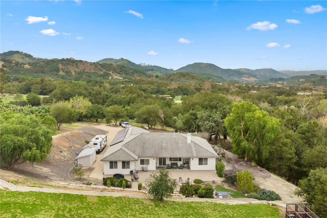 45600 La Cruz Drive Temecula, CA 92590 - Photo 9 of 75 an aerial view of residential houses with outdoor space and trees
