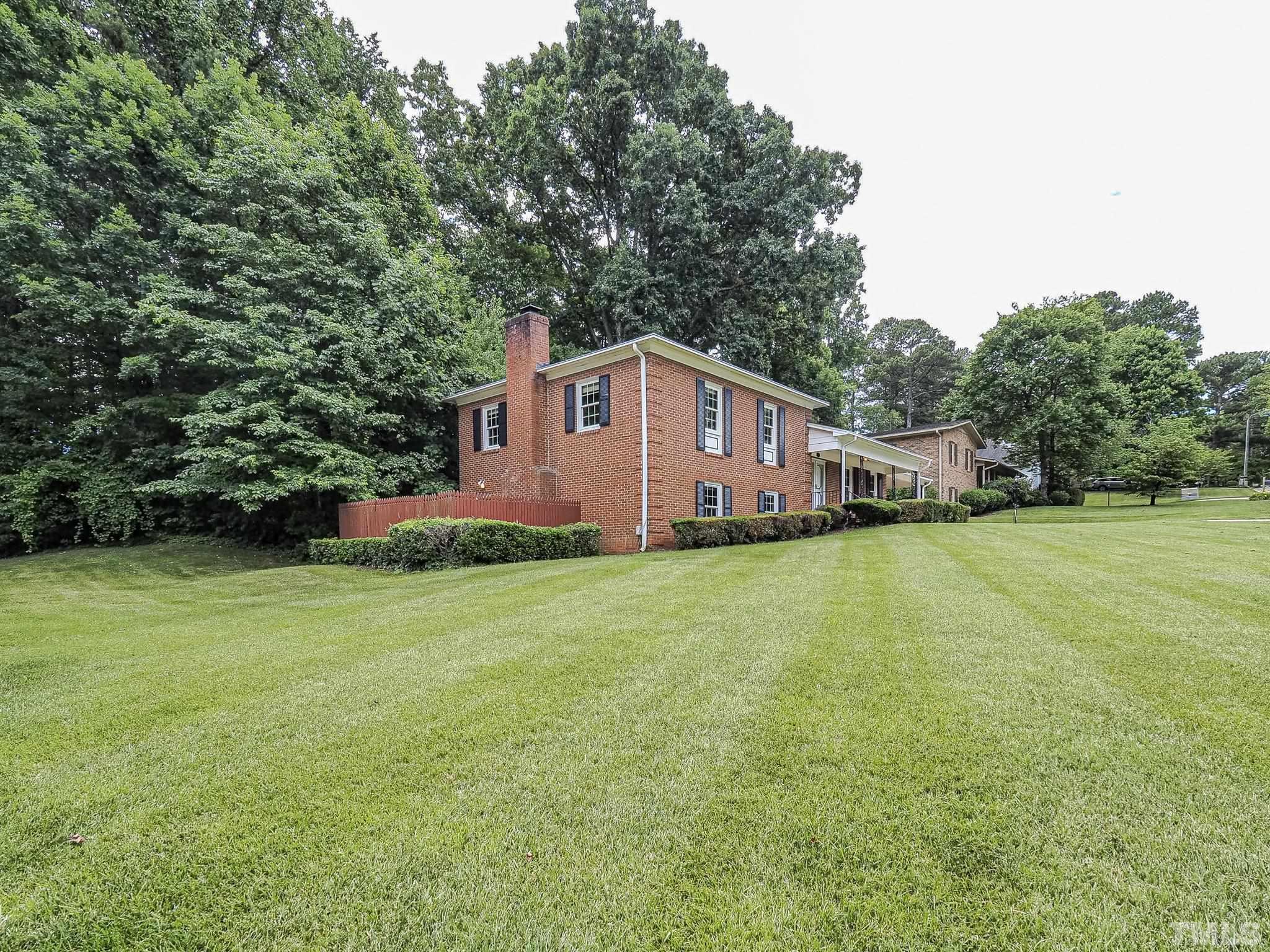 2624 Catalina Drive Raleigh, NC 27607 - Photo 35 of 35 a view of a house with a backyard