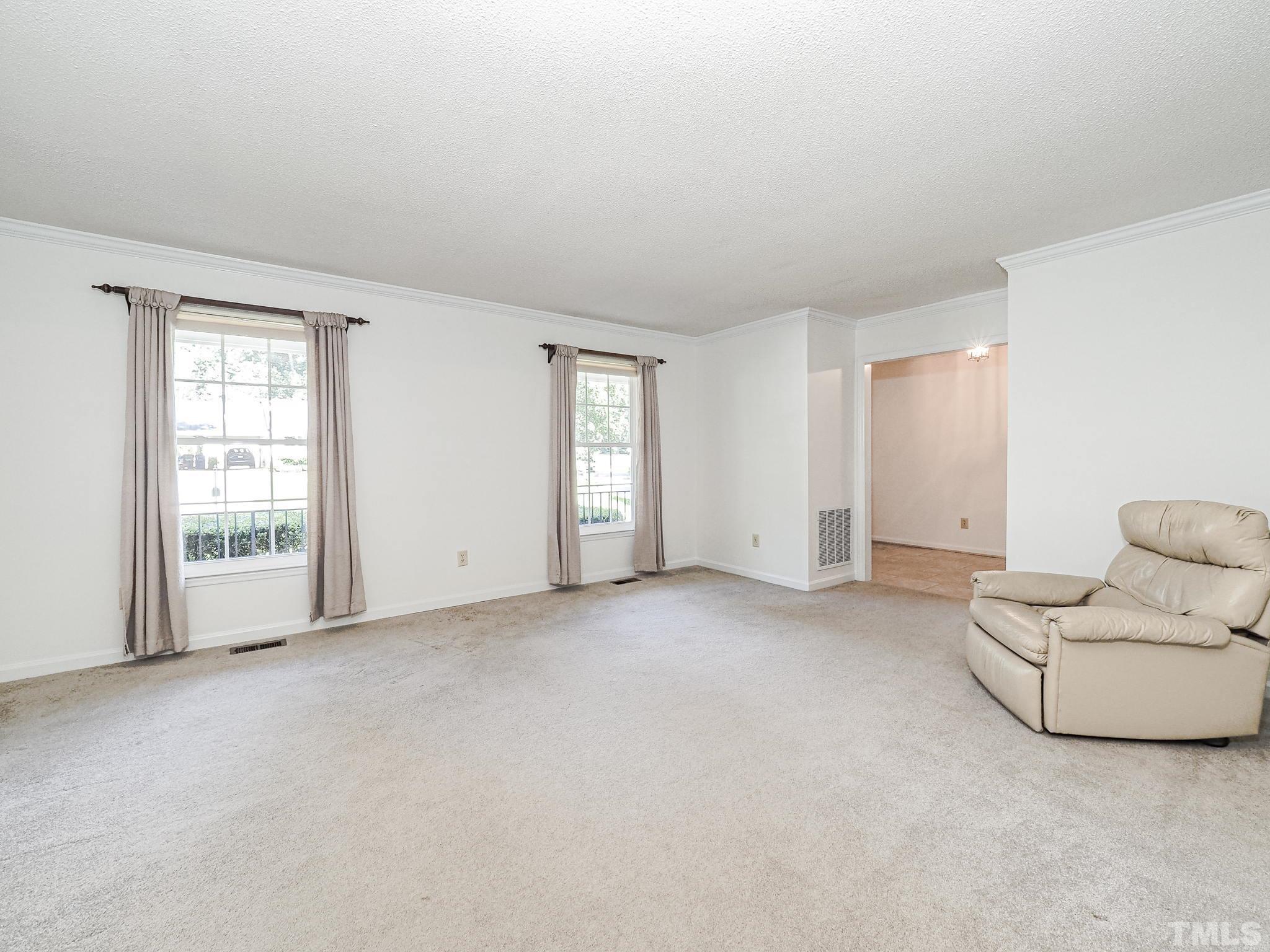 2624 Catalina Drive Raleigh, NC 27607 - Photo 8 of 35 a view of an empty room with a window