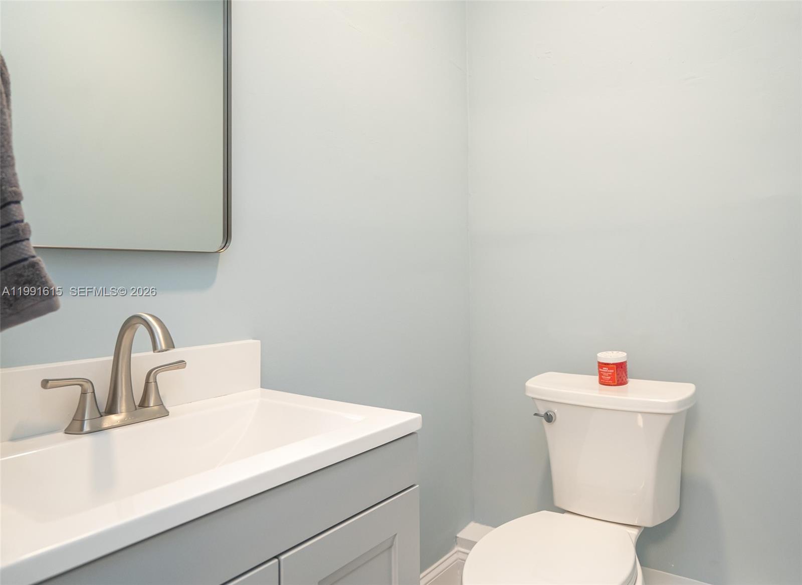 2230 Southwest 60th Court Miami, FL 33155 - Photo 28 of 35 a white toilet sitting next to a white sink