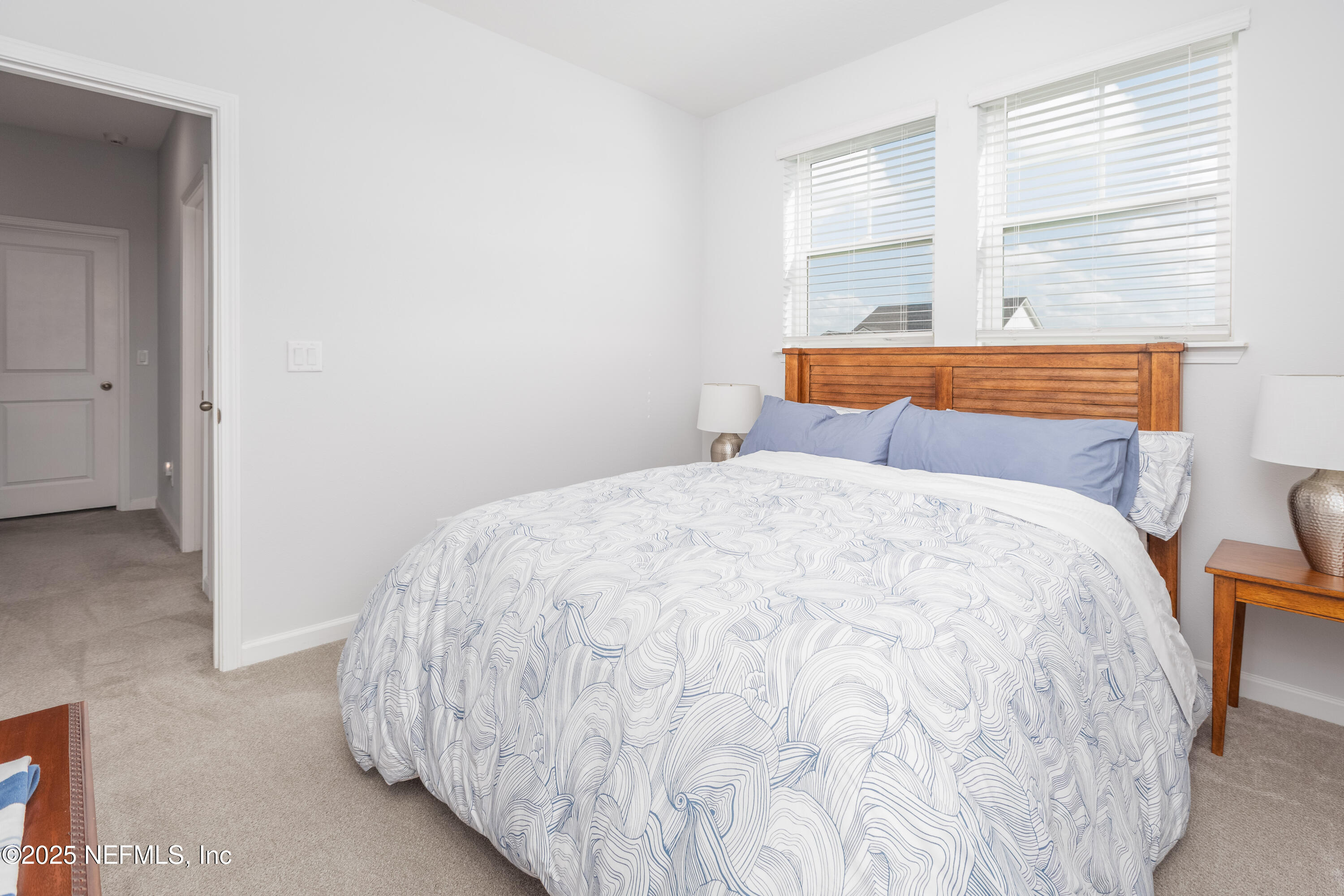 54 Wiltshire Drive St. Augustine, FL 32092 - Photo 12 of 23 a bedroom with a bed and window