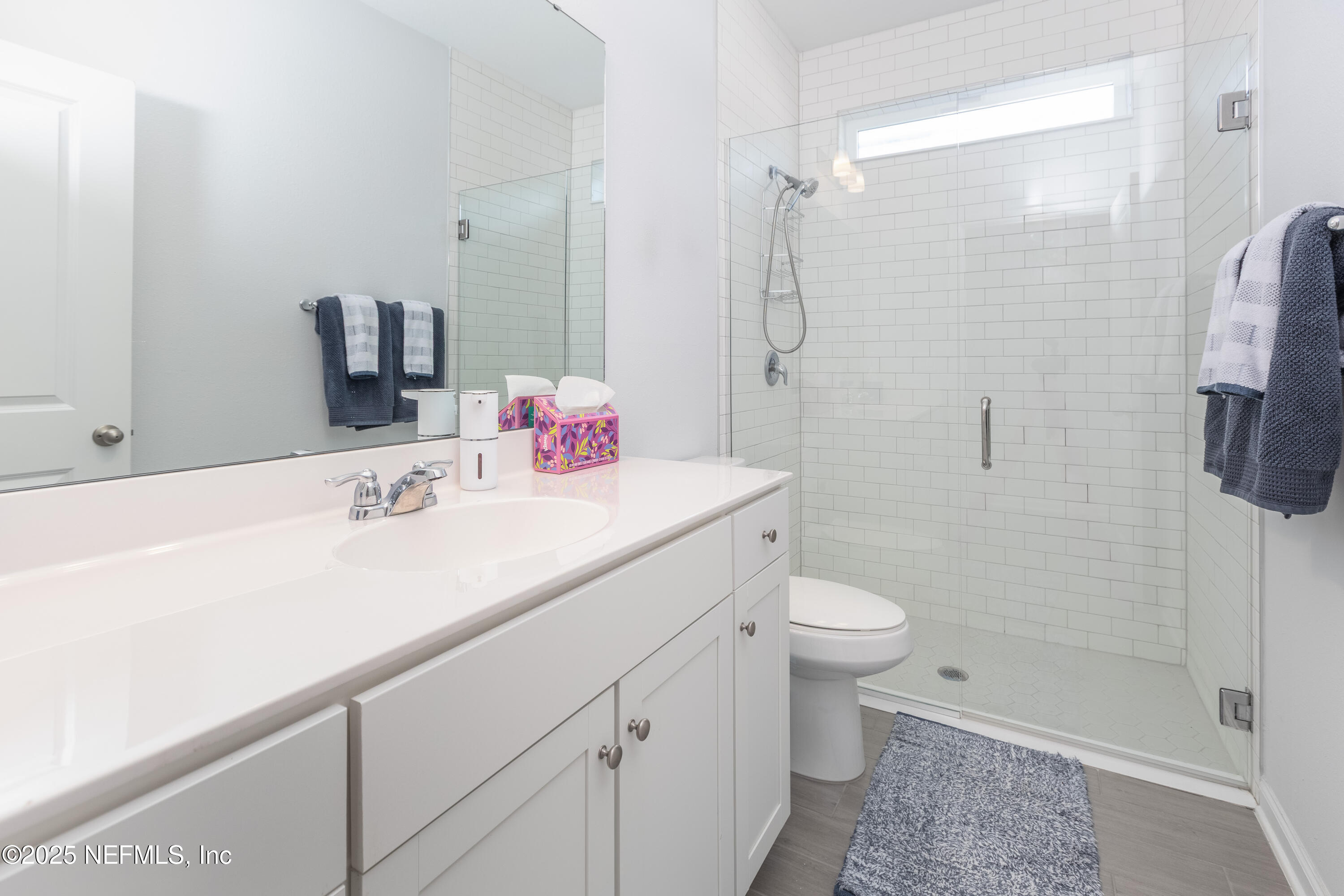 54 Wiltshire Drive St. Augustine, FL 32092 - Photo 13 of 23 a bathroom with a sink a toilet and shower