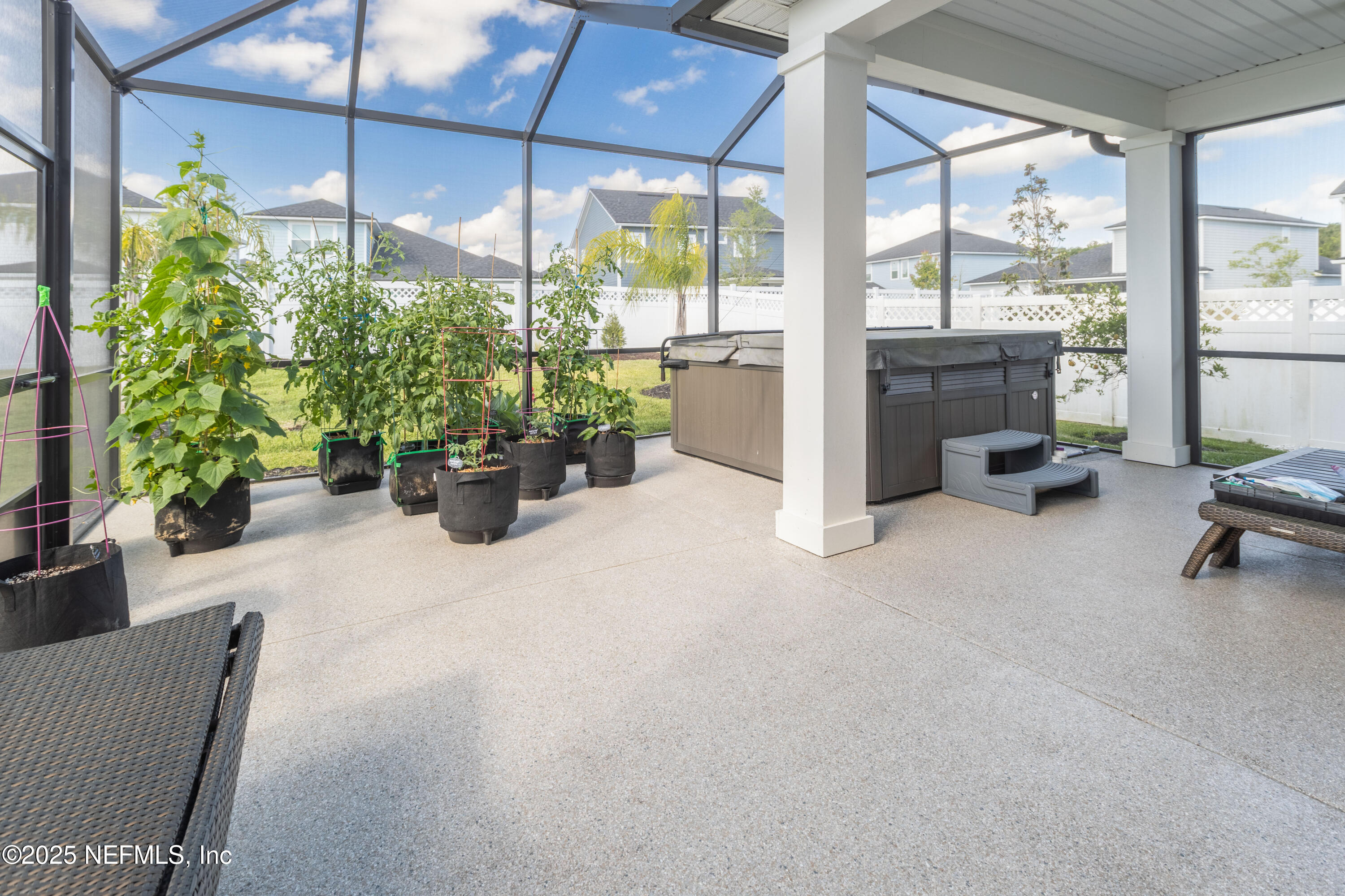 54 Wiltshire Drive St. Augustine, FL 32092 - Photo 14 of 23 a lobby with furniture and floor to ceiling window