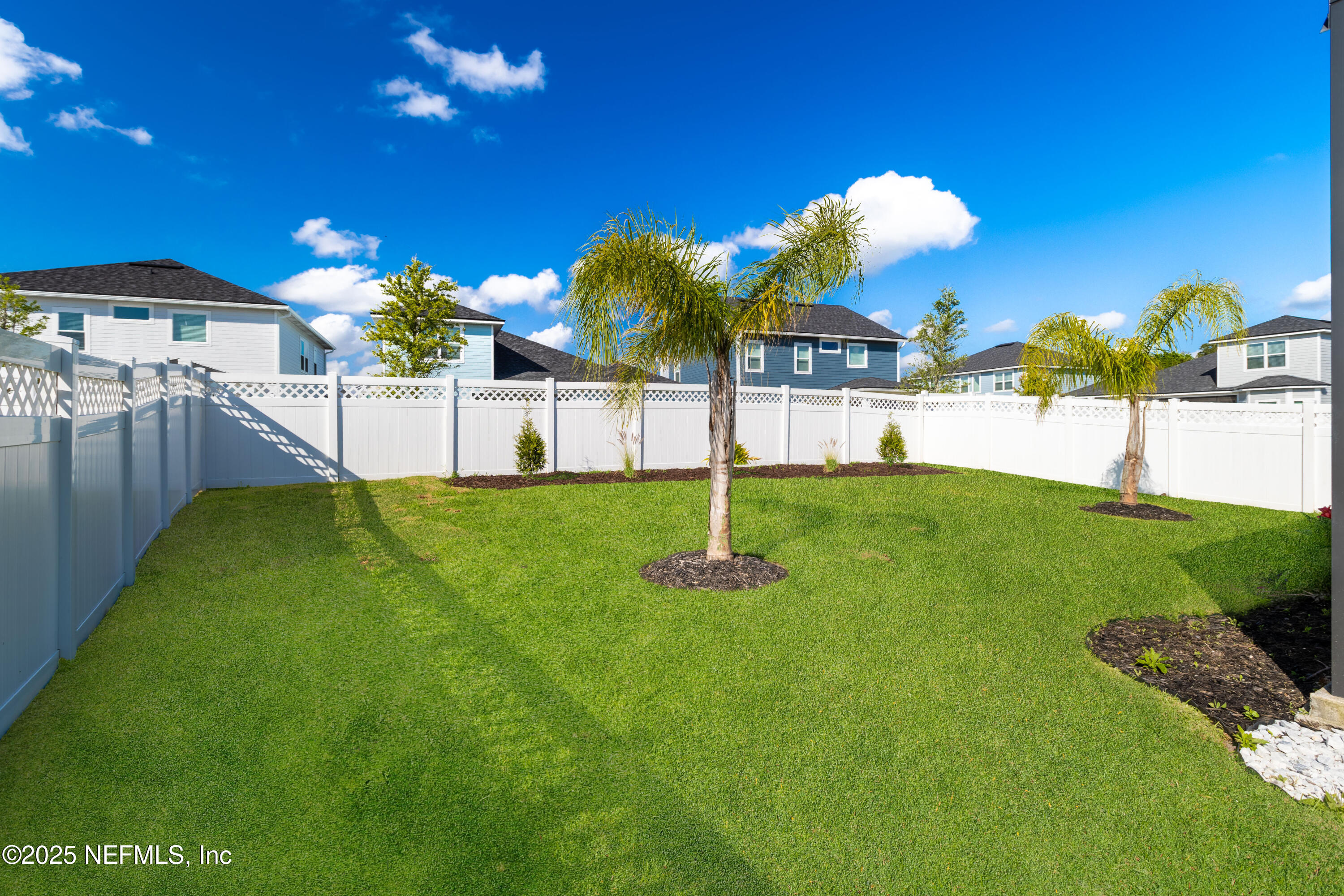 54 Wiltshire Drive St. Augustine, FL 32092 - Photo 16 of 23 a view of a house with a backyard