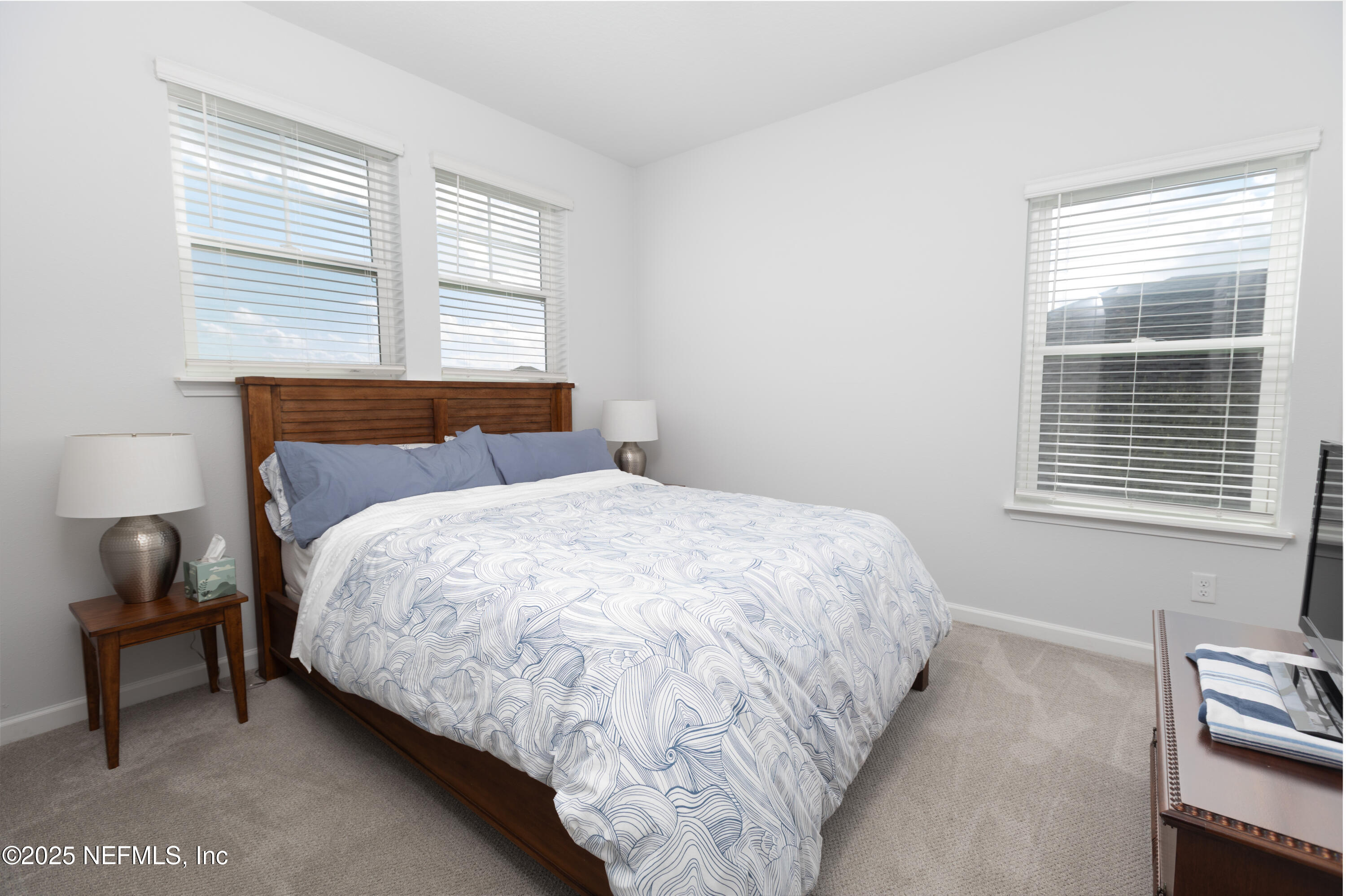 54 Wiltshire Drive St. Augustine, FL 32092 - Photo 9 of 23 a bedroom with a bed and a window