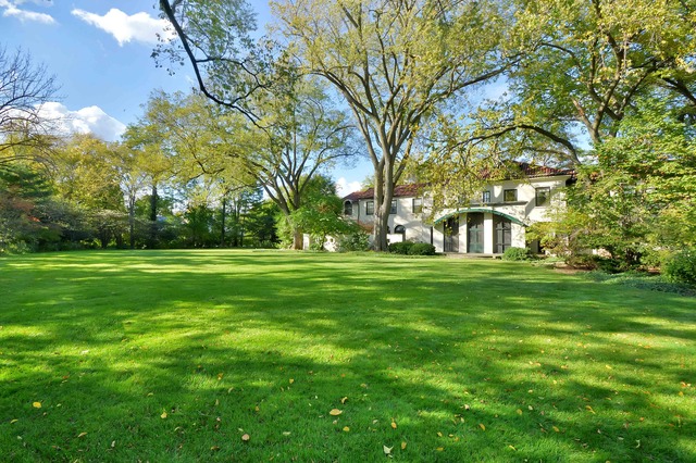 920 Hill Road Winnetka, IL 60093 - Photo 8 of 10 a view of grassy field with benches and trees all around