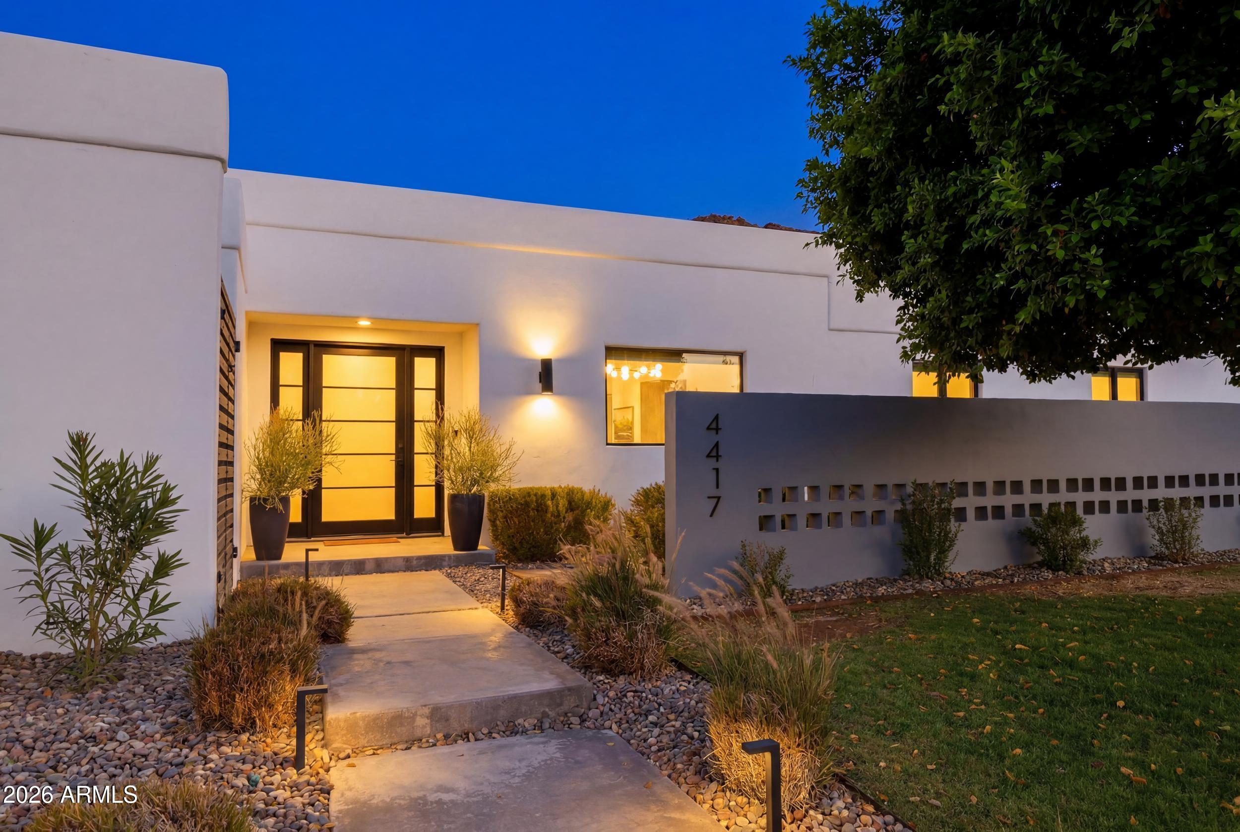 4417 East Mountain View Road Phoenix, AZ 85028 - Photo 3 of 41 a view of a house with garden
