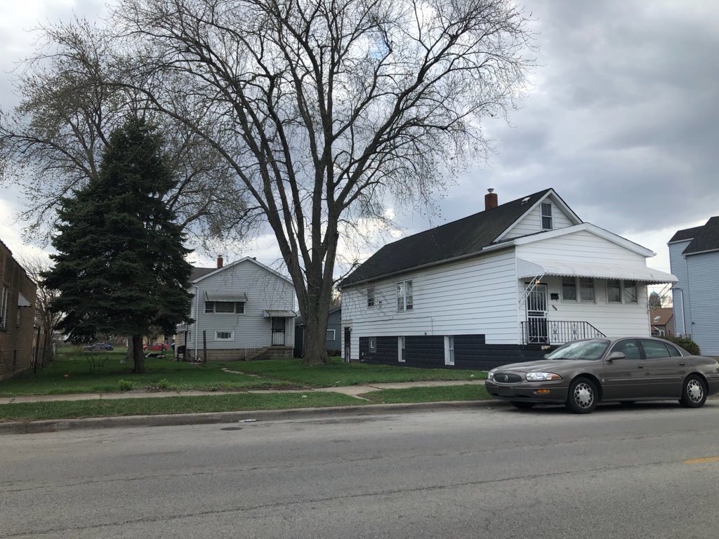 117 Pulaski Road Calumet City, IL 60409 - Photo 2 of 9 a car parked in front of a house