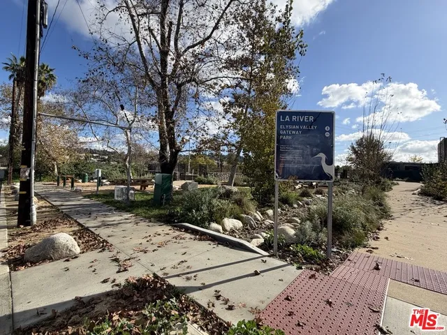 a sign board with parking space