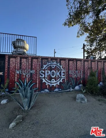 a view of street with sitting area