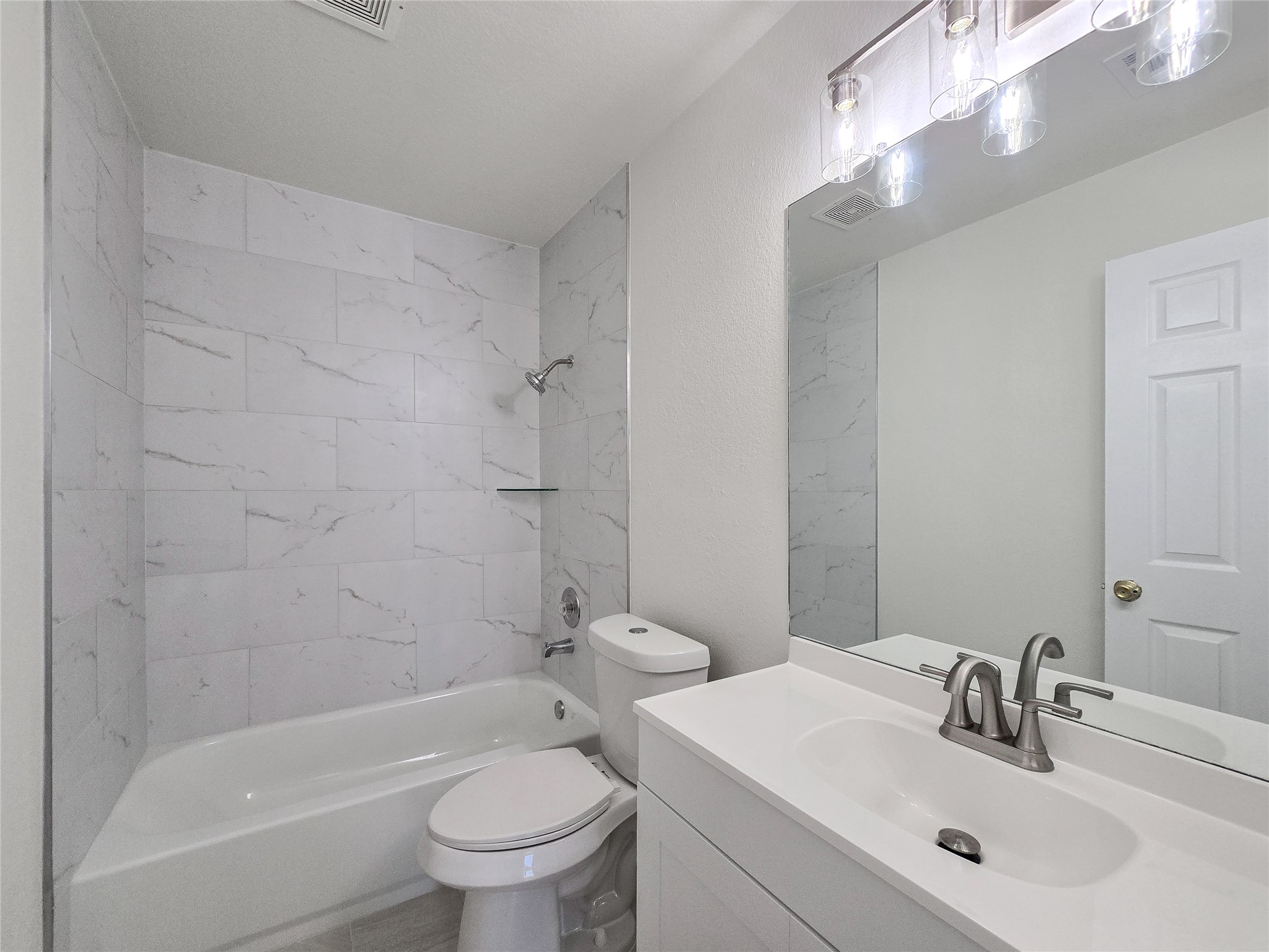 300 Tamara Drive, Unit B Georgetown, TX 78628 - Photo 15 of 16 a bathroom with a sink toilet and shower