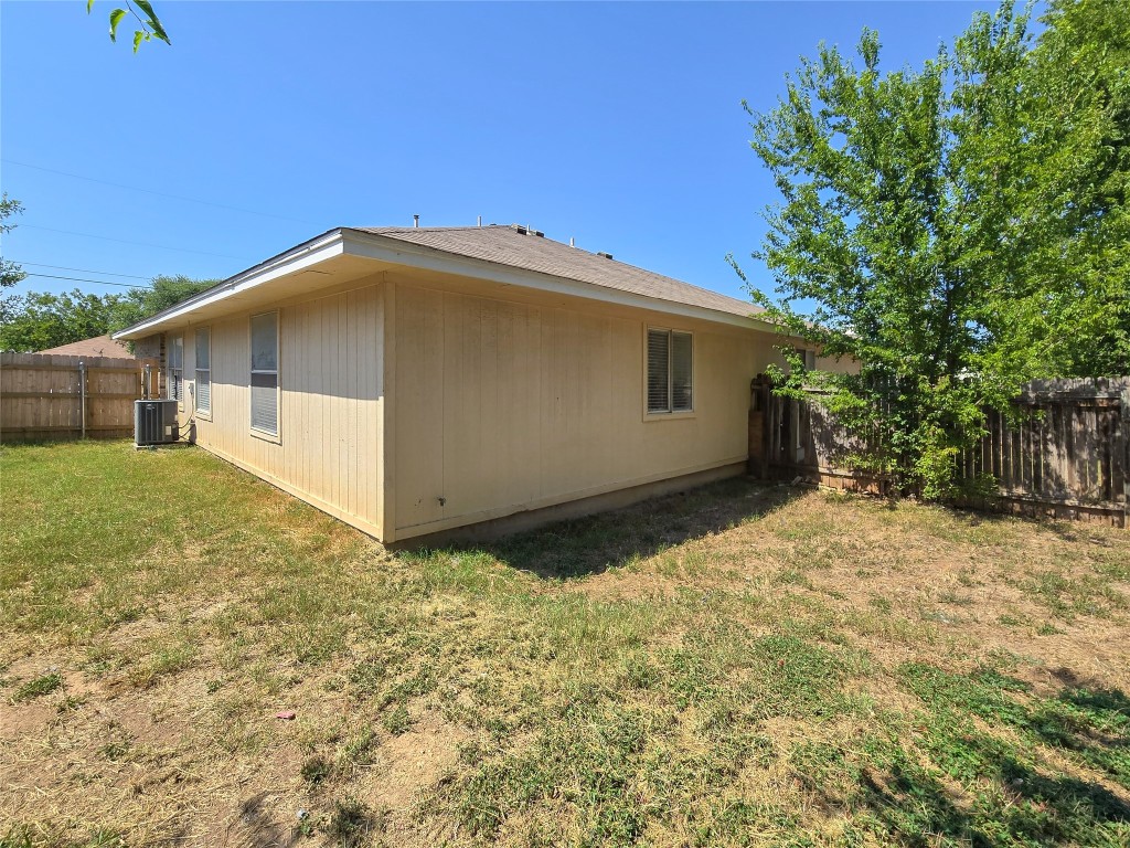 300 Tamara Drive, Unit B Georgetown, TX 78628 - Photo 16 of 16 a view of a house with a yard