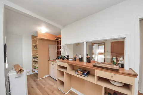 a kitchen with stainless steel appliances a sink and a stove