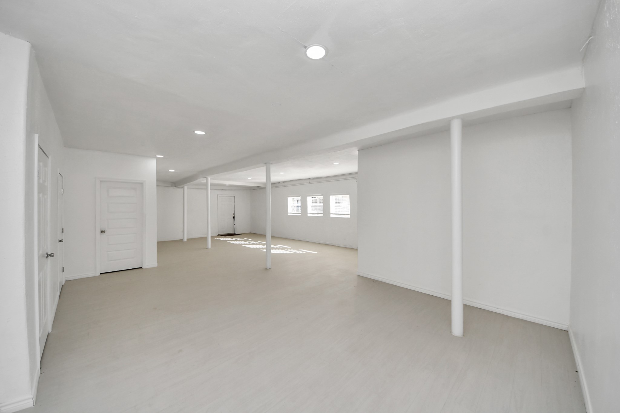 5303 Lyons Avenue, Unit 4 Houston, TX 77020 - Photo 30 of 40 a view of an empty room with a window